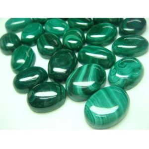 Shop Malachite Cabochons! 3 Pieces 50CTW 18x13mm Each Wholesale Smooth Oval Shaped Malachite Cabochon Lot, Calibrated Malachite Cabochons, PP76 | Natural genuine stones & crystals in various shapes & sizes. Buy raw cut, tumbled, or polished gemstones for making jewelry or crystal healing energy vibration raising reiki stones. #crystals #gemstones #crystalhealing #crystalsandgemstones #energyhealing #affiliate #ad
