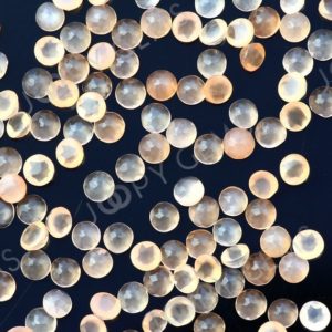 Shop Moonstone Cabochons! Peach Moonstone Rose Cut Cabochon 2mm Round – per stone | Natural genuine stones & crystals in various shapes & sizes. Buy raw cut, tumbled, or polished gemstones for making jewelry or crystal healing energy vibration raising reiki stones. #crystals #gemstones #crystalhealing #crystalsandgemstones #energyhealing #affiliate #ad