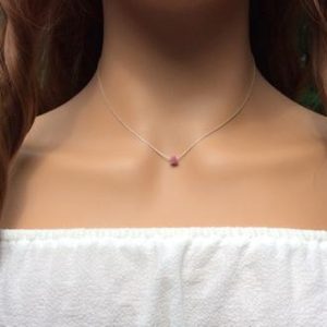 Shop Pink Tourmaline Stones & Crystals! Tiny Raw Pink Tourmaline choker, sterling silver | Natural genuine stones & crystals in various shapes & sizes. Buy raw cut, tumbled, or polished gemstones for making jewelry or crystal healing energy vibration raising reiki stones. #crystals #gemstones #crystalhealing #crystalsandgemstones #energyhealing #affiliate #ad
