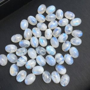 Shop Rainbow Moonstone Cabochons! Rainbow Moonstone Cabochon Oval Shaped 14x10mm | Natural genuine stones & crystals in various shapes & sizes. Buy raw cut, tumbled, or polished gemstones for making jewelry or crystal healing energy vibration raising reiki stones. #crystals #gemstones #crystalhealing #crystalsandgemstones #energyhealing #affiliate #ad