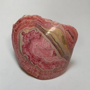 Shop Raw & Rough Rhodochrosite Stones! RHODOCHROSITE STALACTITE Crystal | Natural genuine stones & crystals in various shapes & sizes. Buy raw cut, tumbled, or polished gemstones for making jewelry or crystal healing energy vibration raising reiki stones. #crystals #gemstones #crystalhealing #crystalsandgemstones #energyhealing #affiliate #ad