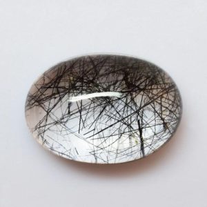 6.82 cts Natural Black Rutilated Quartz 14x10x6.3 mm Cabochon Oval Loose Gemstone – 100% Natural Rutilated Quartz Gemstone – RLBLK-1007 | Natural genuine stones & crystals in various shapes & sizes. Buy raw cut, tumbled, or polished gemstones for making jewelry or crystal healing energy vibration raising reiki stones. #crystals #gemstones #crystalhealing #crystalsandgemstones #energyhealing #affiliate #ad