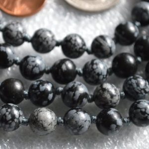 Shop Snowflake Obsidian Jewelry! Snowflake Obsidian Detoxification stone Mala Black Stone Mala Necklace Knotted Crystal healing 108 chakra meditation bead Enhance Inner Self | Natural genuine Snowflake Obsidian jewelry. Buy crystal jewelry, handmade handcrafted artisan jewelry for women.  Unique handmade gift ideas. #jewelry #beadedjewelry #beadedjewelry #gift #shopping #handmadejewelry #fashion #style #product #jewelry #affiliate #ad
