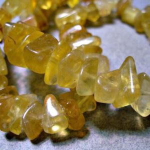 Shop Fluorite Chip & Nugget Beads! Golden Fluorite Nuggets 8-12mm | Natural genuine chip Fluorite beads for beading and jewelry making.  #jewelry #beads #beadedjewelry #diyjewelry #jewelrymaking #beadstore #beading #affiliate #ad