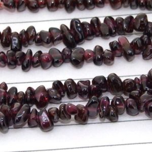 Shop Garnet Chip & Nugget Beads! strand Nugget Chip Wine Garnet Gemstone Beads —– 5mmx 6mm —– about 180Pieces —– gemstone beads— 34" in length | Natural genuine chip Garnet beads for beading and jewelry making.  #jewelry #beads #beadedjewelry #diyjewelry #jewelrymaking #beadstore #beading #affiliate #ad
