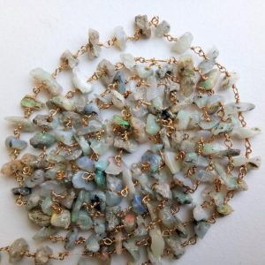 Shop Opal Chip & Nugget Beads! 5-10mm Ethiopian Opal Wire Wrapped Chip Beads, Rosary Style Beaded Chain, Chain By The Foot, 925 Silver Gold Plated Fire Opal Necklace | Natural genuine chip Opal beads for beading and jewelry making.  #jewelry #beads #beadedjewelry #diyjewelry #jewelrymaking #beadstore #beading #affiliate #ad