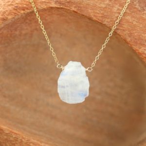Shop Rainbow Moonstone Necklaces! Crystal slice necklace – raw moonstone necklace – rainbow moonstone necklace – june birthstone necklace – 14k gold filled necklace | Natural genuine Rainbow Moonstone necklaces. Buy crystal jewelry, handmade handcrafted artisan jewelry for women.  Unique handmade gift ideas. #jewelry #beadednecklaces #beadedjewelry #gift #shopping #handmadejewelry #fashion #style #product #necklaces #affiliate #ad