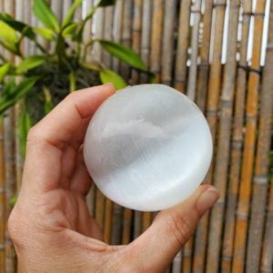 Shop Selenite Shapes! 2.25" 55-60 mm Selenite Sphere, 244-275 grams, Cat Eye, Selenite Crystal Ball | Natural genuine stones & crystals in various shapes & sizes. Buy raw cut, tumbled, or polished gemstones for making jewelry or crystal healing energy vibration raising reiki stones. #crystals #gemstones #crystalhealing #crystalsandgemstones #energyhealing #affiliate #ad