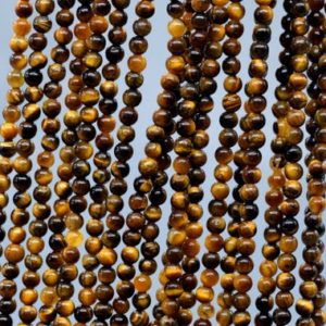 Shop Tiger Eye Round Beads! Genuine Natural Yellow Tiger Eye Loose Beads Grade A Round Shape 3mm 4mm | Natural genuine round Tiger Eye beads for beading and jewelry making.  #jewelry #beads #beadedjewelry #diyjewelry #jewelrymaking #beadstore #beading #affiliate #ad