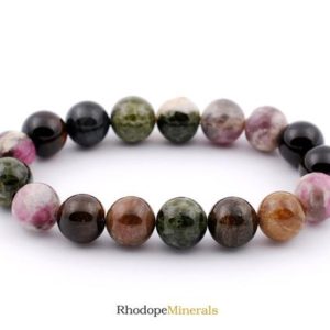 Shop Tourmaline Bracelets! 10mm Multicolor Tourmaline Bracelet, Natural Tourmaline Bracelets, Tourmaline Bracelets 10 mm, Tourmalined Bracelets, Zodiac Strech Bead | Natural genuine Tourmaline bracelets. Buy crystal jewelry, handmade handcrafted artisan jewelry for women.  Unique handmade gift ideas. #jewelry #beadedbracelets #beadedjewelry #gift #shopping #handmadejewelry #fashion #style #product #bracelets #affiliate #ad