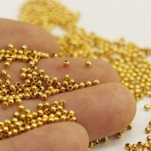 Shop Crimp Beads! 2 mm Gold Tone Crimp Beads, Tiny End cap, Crimp End cap ,Crimp covers, Tiny crimp beads, Mini ball Beads, Gold spacer beads, Round beads | Shop jewelry making and beading supplies, tools & findings for DIY jewelry making and crafts. #jewelrymaking #diyjewelry #jewelrycrafts #jewelrysupplies #beading #affiliate #ad