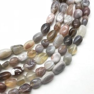 Shop Agate Chip & Nugget Beads! 7-9mm Botswana Agate Nugget Beads, Gemstone Beads, Wholesale Beads | Natural genuine chip Agate beads for beading and jewelry making.  #jewelry #beads #beadedjewelry #diyjewelry #jewelrymaking #beadstore #beading #affiliate #ad