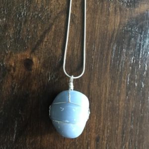 Shop Angelite Necklaces! Angelite Pendant with Silver Wrapping and Silver Chain | Natural genuine Angelite necklaces. Buy crystal jewelry, handmade handcrafted artisan jewelry for women.  Unique handmade gift ideas. #jewelry #beadednecklaces #beadedjewelry #gift #shopping #handmadejewelry #fashion #style #product #necklaces #affiliate #ad