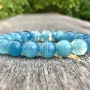 Shop Blue Calcite Jewelry! Chunky Banded Blue Calcite Bracelet 12mm Grade AAA Clear Blue Calcite Beaded Gemstone Bracelet Stack Bracelet Unisex Bracelet Gift Bracelet | Natural genuine Blue Calcite jewelry. Buy crystal jewelry, handmade handcrafted artisan jewelry for women.  Unique handmade gift ideas. #jewelry #beadedjewelry #beadedjewelry #gift #shopping #handmadejewelry #fashion #style #product #jewelry #affiliate #ad