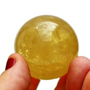 Shop Calcite Shapes! Yellow Calcite Crystal Sphere (39mm x 39mm x 39mm) – Natural Honey Calcite – Gift for Home – Balancing Energy Stone – Metaphysical Crystal | Natural genuine stones & crystals in various shapes & sizes. Buy raw cut, tumbled, or polished gemstones for making jewelry or crystal healing energy vibration raising reiki stones. #crystals #gemstones #crystalhealing #crystalsandgemstones #energyhealing #affiliate #ad