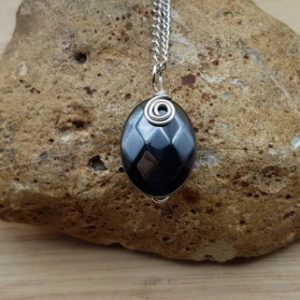 Shop Hematite Pendants! Faceted Hematite pendant necklace. Reiki jewelry. Grey Wire wrapped pendant uk. 20x15mm stone. Silver plated necklaces for women | Natural genuine Hematite pendants. Buy crystal jewelry, handmade handcrafted artisan jewelry for women.  Unique handmade gift ideas. #jewelry #beadedpendants #beadedjewelry #gift #shopping #handmadejewelry #fashion #style #product #pendants #affiliate #ad