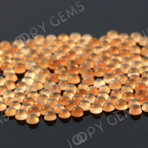 Shop Moonstone Cabochons! Peach Moonstone Cabochon 2mm Round – per stone | Natural genuine stones & crystals in various shapes & sizes. Buy raw cut, tumbled, or polished gemstones for making jewelry or crystal healing energy vibration raising reiki stones. #crystals #gemstones #crystalhealing #crystalsandgemstones #energyhealing #affiliate #ad