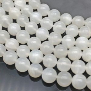 Shop Moonstone Round Beads! 10mm Natural White Moonstone Beads, Round Gemstone Beads, Wholesale Beads | Natural genuine round Moonstone beads for beading and jewelry making.  #jewelry #beads #beadedjewelry #diyjewelry #jewelrymaking #beadstore #beading #affiliate #ad