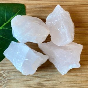 Shop Pink Calcite Stones & Crystals! Natural Pink Calcite raw Stones Set with Gift Bag | Natural genuine stones & crystals in various shapes & sizes. Buy raw cut, tumbled, or polished gemstones for making jewelry or crystal healing energy vibration raising reiki stones. #crystals #gemstones #crystalhealing #crystalsandgemstones #energyhealing #affiliate #ad