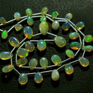 Shop Opal Bead Shapes! 13.5 Inches Strand Natural AA Ethiopian Opal Beads 4.5x6mm to 6×9.5mm Smooth Pear Briolettes Gemstone Beads Superb Opal Stone Beads No3594 | Natural genuine other-shape Opal beads for beading and jewelry making.  #jewelry #beads #beadedjewelry #diyjewelry #jewelrymaking #beadstore #beading #affiliate #ad