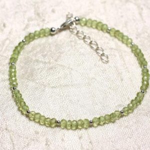 Shop Peridot Bracelets! Bracelet Argent 925 et Pierre – Péridot rondelles facettées 3mm | Natural genuine Peridot bracelets. Buy crystal jewelry, handmade handcrafted artisan jewelry for women.  Unique handmade gift ideas. #jewelry #beadedbracelets #beadedjewelry #gift #shopping #handmadejewelry #fashion #style #product #bracelets #affiliate #ad