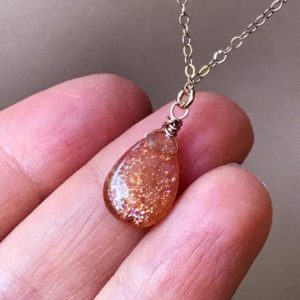 Natural Sunstone pendant 14k Gold fill necklace, Orange stone jewelry, genuine Sunstone drop, wire wrapped teardrop. | Natural genuine Sunstone pendants. Buy crystal jewelry, handmade handcrafted artisan jewelry for women.  Unique handmade gift ideas. #jewelry #beadedpendants #beadedjewelry #gift #shopping #handmadejewelry #fashion #style #product #pendants #affiliate #ad