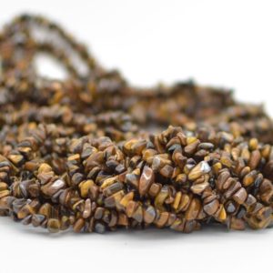 Shop Tiger Eye Chip & Nugget Beads! High Quality Grade A Natural Tigers Eye Semi-precious Gemstone Chips Nuggets Beads – 5mm – 8mm, 32" Strand | Natural genuine chip Tiger Eye beads for beading and jewelry making.  #jewelry #beads #beadedjewelry #diyjewelry #jewelrymaking #beadstore #beading #affiliate #ad