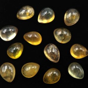 Shop Yellow Sapphire Stones & Crystals! Saphir jaune (Yellow sapphire pear cabochon) – cabochon – poire – 13pcs – 15.50Cts – 7*5mm | Natural genuine stones & crystals in various shapes & sizes. Buy raw cut, tumbled, or polished gemstones for making jewelry or crystal healing energy vibration raising reiki stones. #crystals #gemstones #crystalhealing #crystalsandgemstones #energyhealing #affiliate #ad