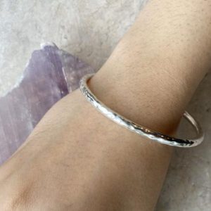 Shop Amber Bracelets! Sterling Silver Hammered Cuff Bracelet // Amber Bracelet // Baltic Amber // Amber | Natural genuine Amber bracelets. Buy crystal jewelry, handmade handcrafted artisan jewelry for women.  Unique handmade gift ideas. #jewelry #beadedbracelets #beadedjewelry #gift #shopping #handmadejewelry #fashion #style #product #bracelets #affiliate #ad