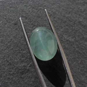 Shop Aquamarine Cabochons! 16x12mm Aquamarine oval cabochon 15ct Cat's eye natural loose gemstone | Natural genuine stones & crystals in various shapes & sizes. Buy raw cut, tumbled, or polished gemstones for making jewelry or crystal healing energy vibration raising reiki stones. #crystals #gemstones #crystalhealing #crystalsandgemstones #energyhealing #affiliate #ad