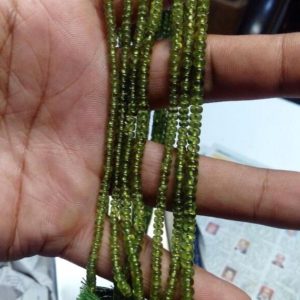 Shop Garnet Rondelle Beads! 4mm Green Garnet Vessuvianate Vessonite Rondelle Beads, Vessonite Beads, 13 Inch Strand | Natural genuine rondelle Garnet beads for beading and jewelry making.  #jewelry #beads #beadedjewelry #diyjewelry #jewelrymaking #beadstore #beading #affiliate #ad