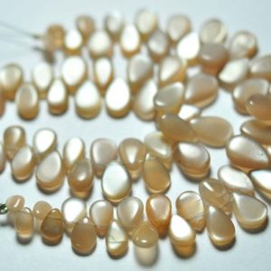 Shop Moonstone Bead Shapes! Natural Peach Moonstone Beads 5x7mm to 8x12mm Smooth Pear Briolettes  Gemstone Beads Superb Moonstone Stone Beads – 6.5 Inches Strand No3858 | Natural genuine other-shape Moonstone beads for beading and jewelry making.  #jewelry #beads #beadedjewelry #diyjewelry #jewelrymaking #beadstore #beading #affiliate #ad