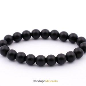 Shop Onyx Bracelets! Black Onyx Bracelet, Black Onyx Bracelet 8 mm Beads, Black Onyx, Bracelets, Metaphysical Crystals, Gifts, Crystals, Gemstones, Gems, Stones | Natural genuine Onyx bracelets. Buy crystal jewelry, handmade handcrafted artisan jewelry for women.  Unique handmade gift ideas. #jewelry #beadedbracelets #beadedjewelry #gift #shopping #handmadejewelry #fashion #style #product #bracelets #affiliate #ad