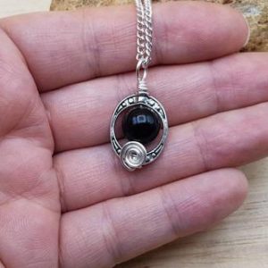 Shop Rainbow Obsidian Jewelry! Minimalist Rainbow Obsidian pendant. Reiki jewelry uk. Silver plated Wire wrapped pendant. Oval frame necklace. 10mm stone. C1 | Natural genuine Rainbow Obsidian jewelry. Buy crystal jewelry, handmade handcrafted artisan jewelry for women.  Unique handmade gift ideas. #jewelry #beadedjewelry #beadedjewelry #gift #shopping #handmadejewelry #fashion #style #product #jewelry #affiliate #ad