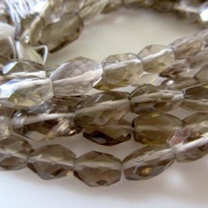 Shop Smoky Quartz Faceted Beads! Natural Smoky Quartz Faceted Oval Tumbles Beads, 8mm Each Approx, 13 Inch Strand, GDS449 | Natural genuine faceted Smoky Quartz beads for beading and jewelry making.  #jewelry #beads #beadedjewelry #diyjewelry #jewelrymaking #beadstore #beading #affiliate #ad