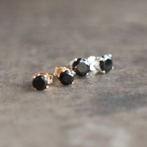Shop Diamond Jewelry! Cz Black Diamond Earrings Studs in Gold & Silver, Small Black Stud Earrings for Men and Women, Gifts for Friend | Natural genuine Diamond jewelry. Buy handcrafted artisan men's jewelry, gifts for men.  Unique handmade mens fashion accessories. #jewelry #beadedjewelry #beadedjewelry #shopping #gift #handmadejewelry #jewelry #affiliate #ad