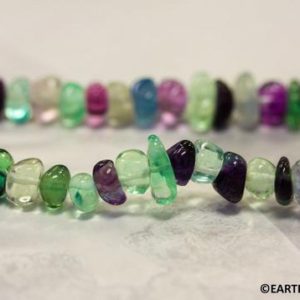 Shop Fluorite Chip & Nugget Beads! M/ Multi-Color Fluorite 6-8mm Tumbled Nugget beads. 15" strand. Transparent Semi-precious Stone  Clean and Grade AAA Quality | Natural genuine chip Fluorite beads for beading and jewelry making.  #jewelry #beads #beadedjewelry #diyjewelry #jewelrymaking #beadstore #beading #affiliate #ad