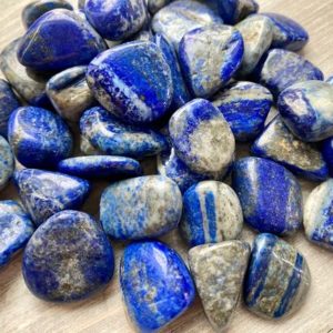 Lapis Lazuli Tumbled Love Courage Wisdom Communication Expression Authentic Relationships Reiki Charged | Natural genuine stones & crystals in various shapes & sizes. Buy raw cut, tumbled, or polished gemstones for making jewelry or crystal healing energy vibration raising reiki stones. #crystals #gemstones #crystalhealing #crystalsandgemstones #energyhealing #affiliate #ad