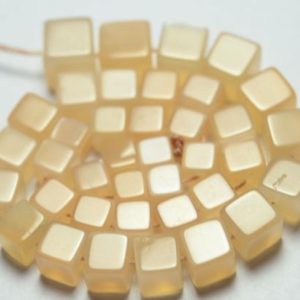 Shop Moonstone Bead Shapes! Natural Peach Moonstone Cubes 5x5mm to 6.5×6.5mm Smooth Cubes Gemstone Beads Superb Moonstone Beads – 8 Inches Strand No4138 | Natural genuine other-shape Moonstone beads for beading and jewelry making.  #jewelry #beads #beadedjewelry #diyjewelry #jewelrymaking #beadstore #beading #affiliate #ad