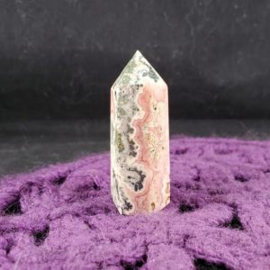 Shop Rhodochrosite Points & Wands! Rhodochrosite Polished Point Healing Stones Generator Tower Crystal Self Standing pink natural druzy vugs | Natural genuine stones & crystals in various shapes & sizes. Buy raw cut, tumbled, or polished gemstones for making jewelry or crystal healing energy vibration raising reiki stones. #crystals #gemstones #crystalhealing #crystalsandgemstones #energyhealing #affiliate #ad