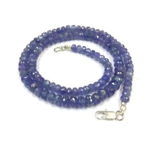 Shop Tanzanite Faceted Beads! Natural Tanzanite Faceted Rondelle Beads 5-6.MM Tanzanite Gemstone Beads Tanzanite Strand Wholesale Tanzanite 18" Strand | Natural genuine faceted Tanzanite beads for beading and jewelry making.  #jewelry #beads #beadedjewelry #diyjewelry #jewelrymaking #beadstore #beading #affiliate #ad