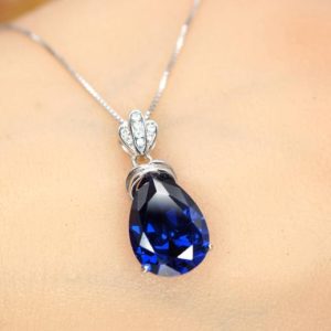 Shop Tanzanite Jewelry! Large Teardrop Tanzanite Necklace – 18KGP Sterling Silver December Birthstone – Pear Cut 7 CT Blue Tanzanite Jewelry | Natural genuine Tanzanite jewelry. Buy crystal jewelry, handmade handcrafted artisan jewelry for women.  Unique handmade gift ideas. #jewelry #beadedjewelry #beadedjewelry #gift #shopping #handmadejewelry #fashion #style #product #jewelry #affiliate #ad