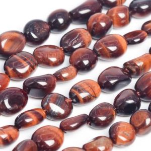 Shop Tiger Eye Chip & Nugget Beads! Genuine Natural Mahogany Red Tiger Eye Loose Beads Grade AA Pebble Nugget Shape 7-9mm | Natural genuine chip Tiger Eye beads for beading and jewelry making.  #jewelry #beads #beadedjewelry #diyjewelry #jewelrymaking #beadstore #beading #affiliate #ad