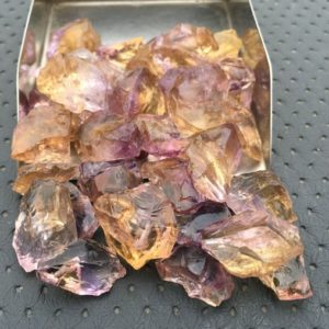Shop Raw & Rough Ametrine Stones! 10 Piece Genuine Ametrine Size 16-20 MM Rough, AAA Grade Natural Ametrine Gemstone Raw, Gemstone Mixture Raw Big Size Rough Making Jewelry | Natural genuine stones & crystals in various shapes & sizes. Buy raw cut, tumbled, or polished gemstones for making jewelry or crystal healing energy vibration raising reiki stones. #crystals #gemstones #crystalhealing #crystalsandgemstones #energyhealing #affiliate #ad