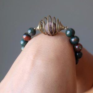 Shop Bloodstone Bracelets! Brown Moqui Marble & Green Bloodstone Bracelet Shamanic Stone Cage | Natural genuine Bloodstone bracelets. Buy crystal jewelry, handmade handcrafted artisan jewelry for women.  Unique handmade gift ideas. #jewelry #beadedbracelets #beadedjewelry #gift #shopping #handmadejewelry #fashion #style #product #bracelets #affiliate #ad