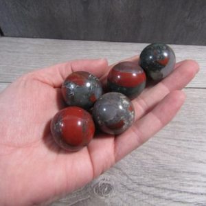 Shop Bloodstone Shapes! African Bloodstone Sphere 26 mm to 30 mm S46 | Natural genuine stones & crystals in various shapes & sizes. Buy raw cut, tumbled, or polished gemstones for making jewelry or crystal healing energy vibration raising reiki stones. #crystals #gemstones #crystalhealing #crystalsandgemstones #energyhealing #affiliate #ad