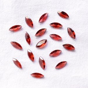 Shop Garnet Cabochons! 10 Pcs Lot Red Garnet Loose Gemstone, Faceted Garnet Gemstone, Marquise Shape Garnet Cabochons, 6x12mm Stone Size #PP9387 | Natural genuine stones & crystals in various shapes & sizes. Buy raw cut, tumbled, or polished gemstones for making jewelry or crystal healing energy vibration raising reiki stones. #crystals #gemstones #crystalhealing #crystalsandgemstones #energyhealing #affiliate #ad