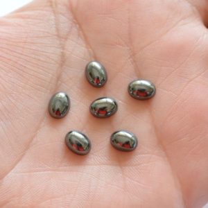 Shop Hematite Cabochons! Oval Shape Gemstone, Hematite Cabochons, Flat Back, Dark Silver Color, Smooth Cabochon, Polished Hematite, 5 Piece Lot, 6x8mm #AR8738 | Natural genuine stones & crystals in various shapes & sizes. Buy raw cut, tumbled, or polished gemstones for making jewelry or crystal healing energy vibration raising reiki stones. #crystals #gemstones #crystalhealing #crystalsandgemstones #energyhealing #affiliate #ad