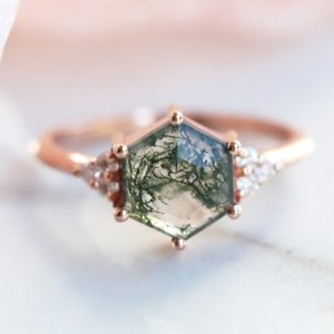Shop Moss Agate Jewelry! Moss agate ring, Hexagon engagement ring, Green gemstone & diamond ring, Organic ring | Natural genuine Moss Agate jewelry. Buy handcrafted artisan wedding jewelry.  Unique handmade bridal jewelry gift ideas. #jewelry #beadedjewelry #gift #crystaljewelry #shopping #handmadejewelry #wedding #bridal #jewelry #affiliate #ad
