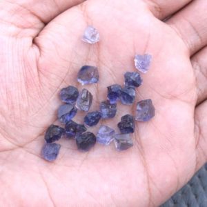 Shop Raw & Rough Iolite Stones! 50 Piece Iolite Raw Mineral Size 6-8 MM Loose Gemstone Blue Iolite Raw Stone Awesome Quality Iolite Raw Natural Iolite Rough Gemstone | Natural genuine stones & crystals in various shapes & sizes. Buy raw cut, tumbled, or polished gemstones for making jewelry or crystal healing energy vibration raising reiki stones. #crystals #gemstones #crystalhealing #crystalsandgemstones #energyhealing #affiliate #ad
